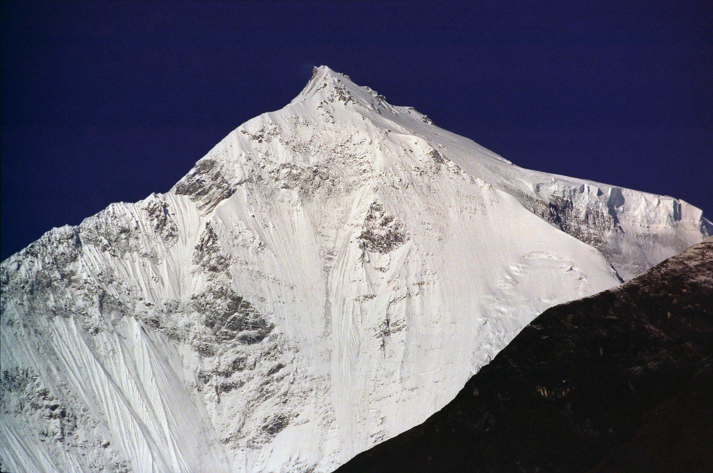 204 Dhaulagiri Northeast Face From Before Tukuche Then there was the north ridge; it was undoubtedly ice, but, judging from the moderate angle and slight rise in height would make it very suitable for an attempt (Maurice Herzog, Annapurna). How right he was. The normal climbing route used on the first ascent goes from right to left up the northeast ridge to the summit ridge and then across to the summit.